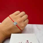 Srebrna narukvica crveni konac beli anđeo 294 145000